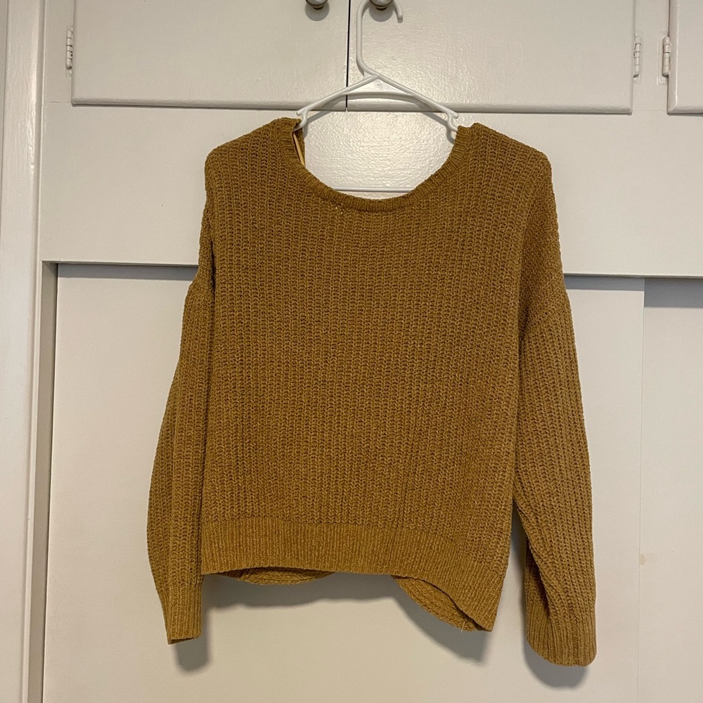Yellow off the shoulder sweater.